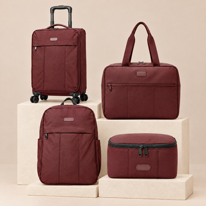 Bon Voyage burgundy bag set on studio plinths