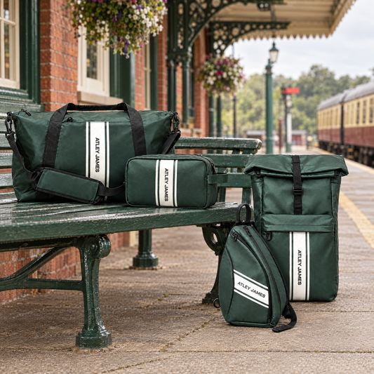 Atley James green sport bag set on an English countryside train platform