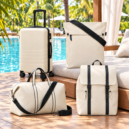 AJ Skye cream spinner and bags at a resort poolside cabana
